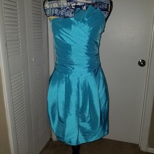 Turquoise color satin dress)
